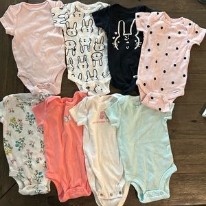 Lot of 8 0/3 month onesies in very good condition